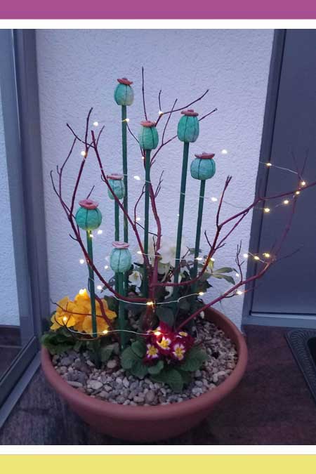 CHRISTMAS ROSE WITH STYLIZED GARDEN DECOR